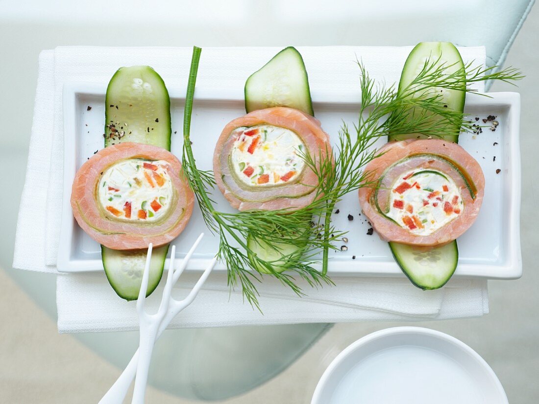 Cucumber and salmon roulade stuffed with cream cheese