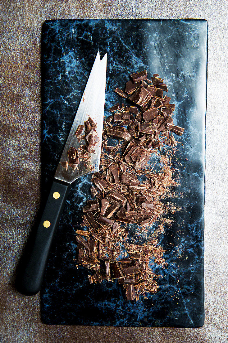 Chopped chocolate with a knife