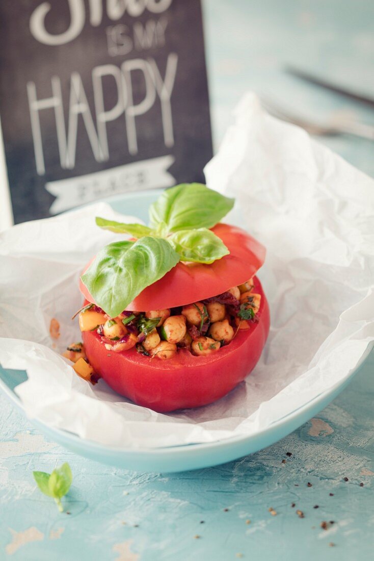 A tomato stuffed with chickpeas