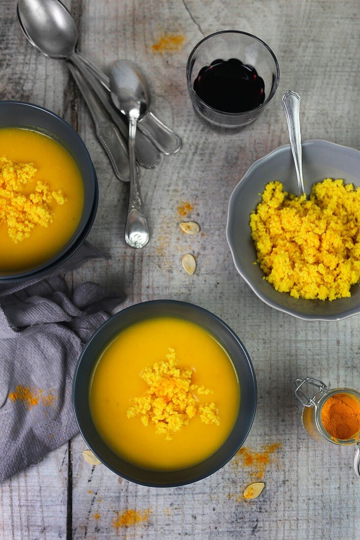 Cream of pumpkin soup with turmeric couscous