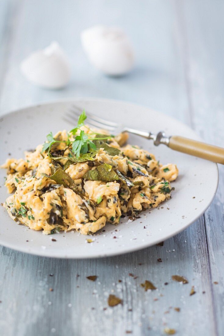 Scrambled eggs with seaweed bacon and spring onions