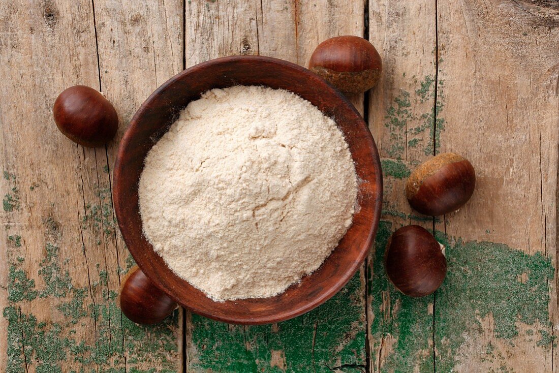 Chestnut flour in a wooden bowl