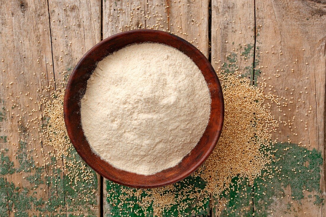Quinoa flour in a wooden bowl