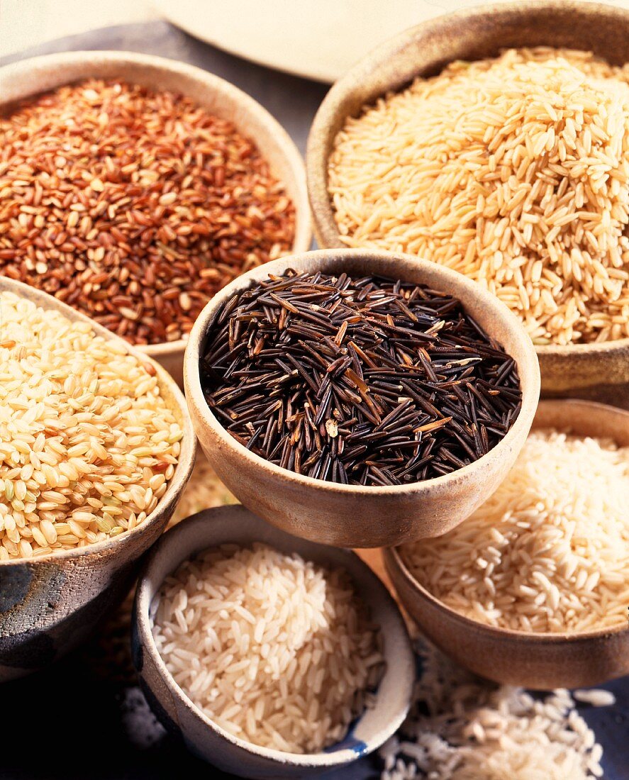 Various types of rice in bowls