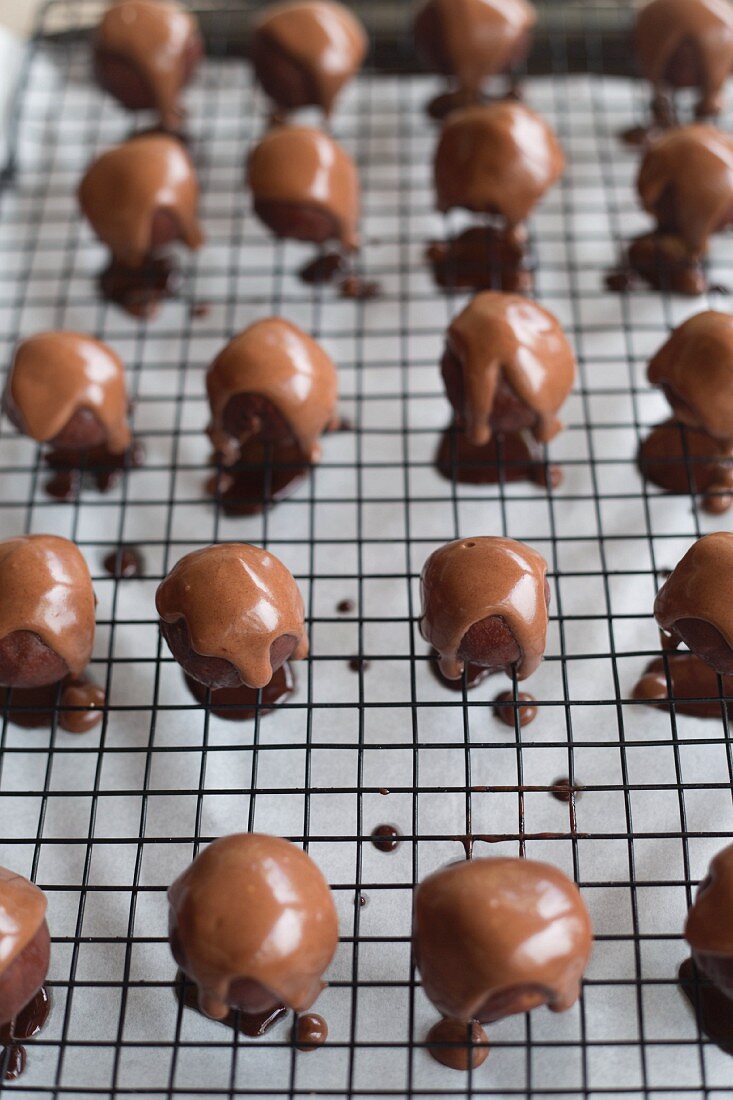 Peanut butter energy balls on a cooling rack