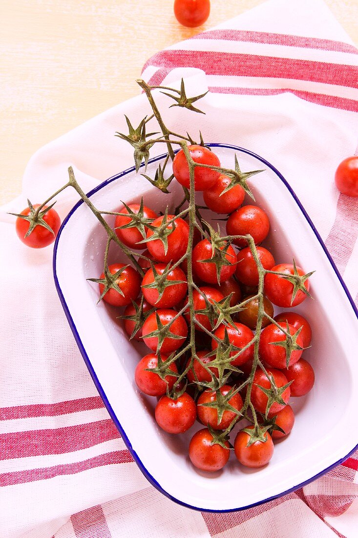Cherry tomatoes in an enamel dish