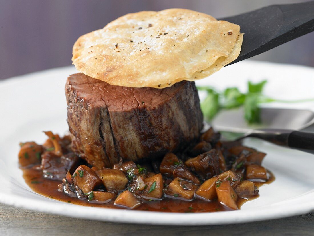 Fried beef fillet with mushrooms and a crispy crust