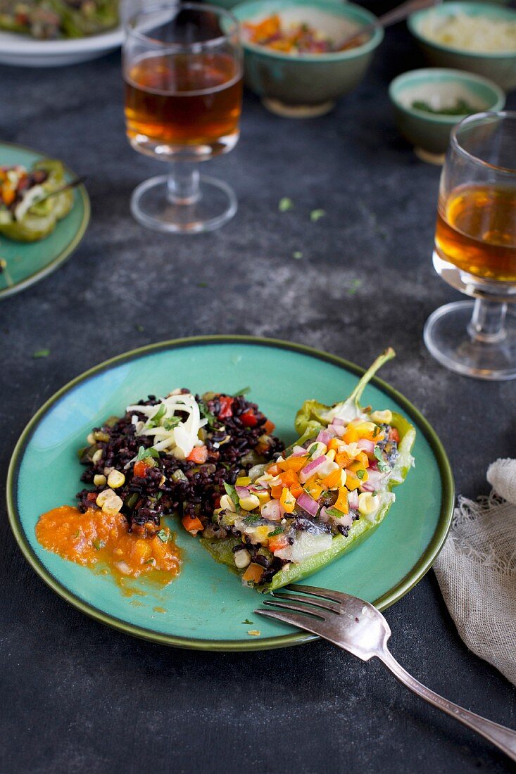 Black Rice Stuff Roasted Peppers with Veggie Pico de Gallo served with salsa and beer
