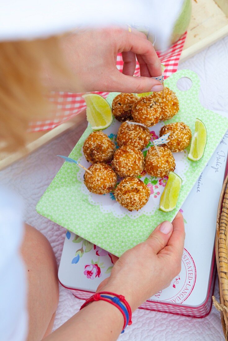 Fish balls with celery, onion and sesame for a beach picnic