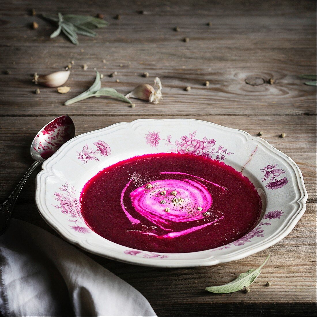 Beetroot cream soup on rustic table