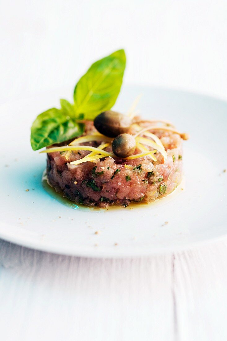 Calf tartare with capers and basil