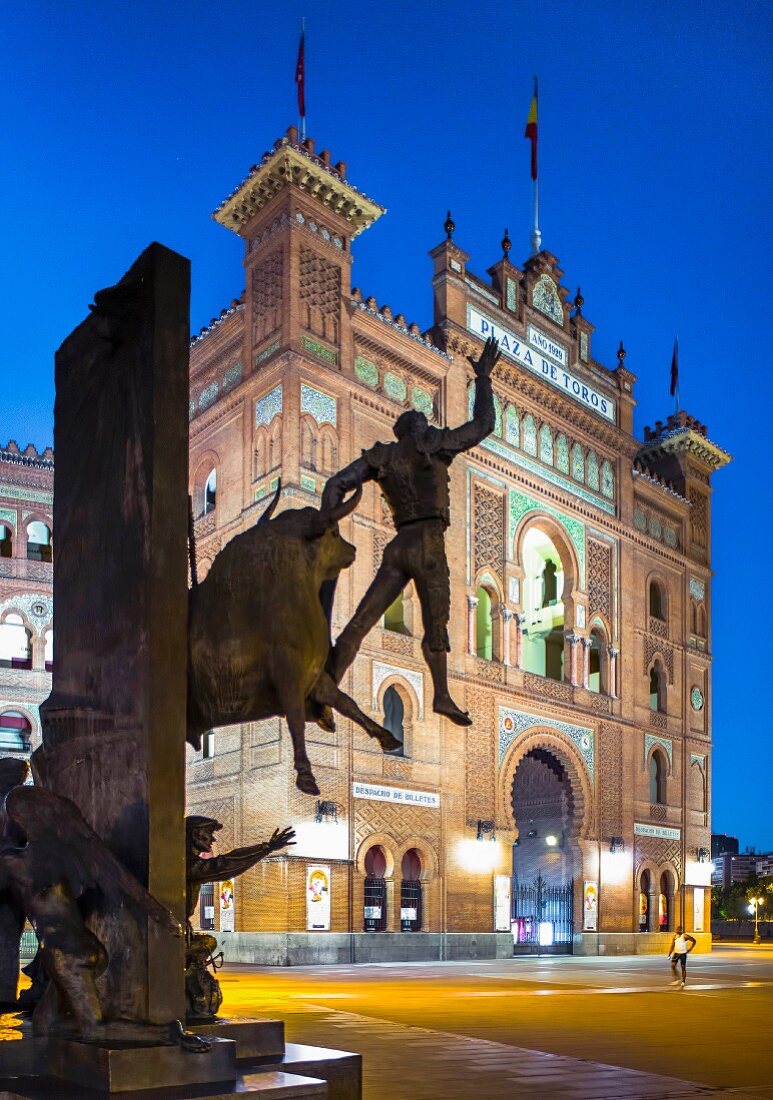 A bronze sculpture in front of the Plaza de Toros de Las Ventas bullfighting arena in Madrid, Spain