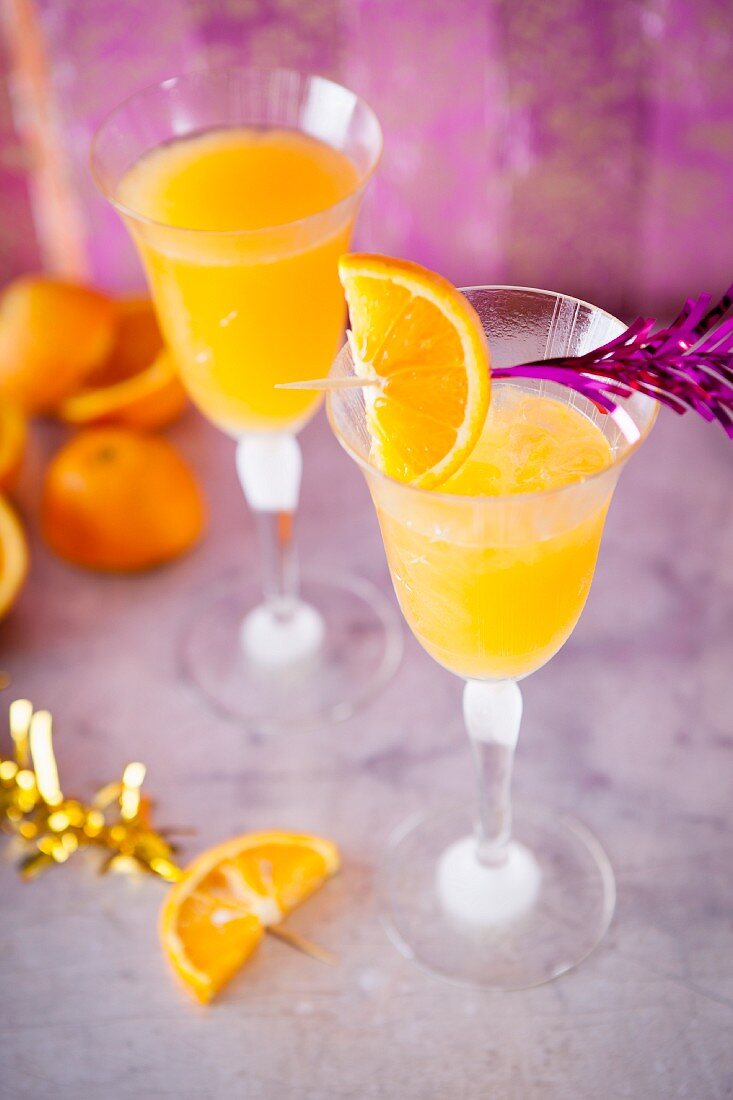 Apricot sour cocktails with orange juice