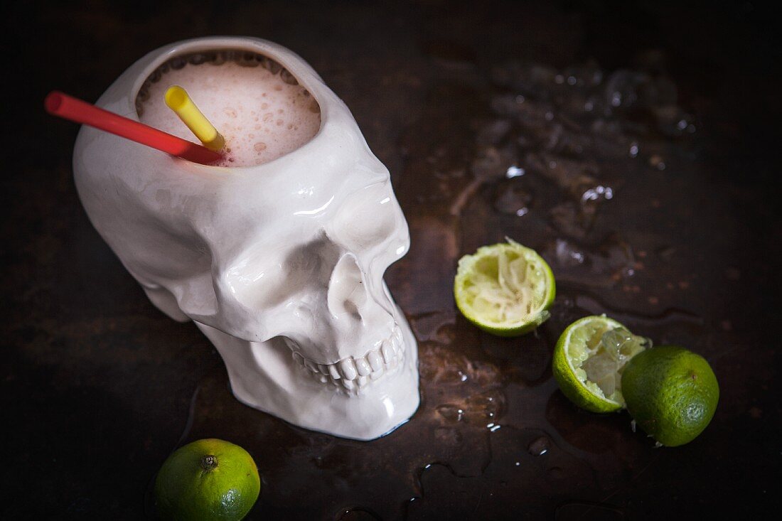 A zombie cocktail served in a skull
