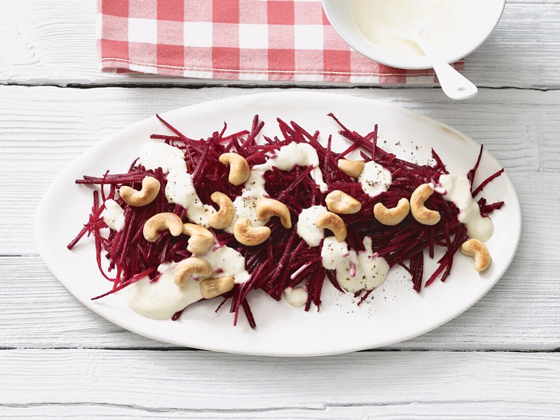 Raw beetroot with cashew nuts and an orange dressing