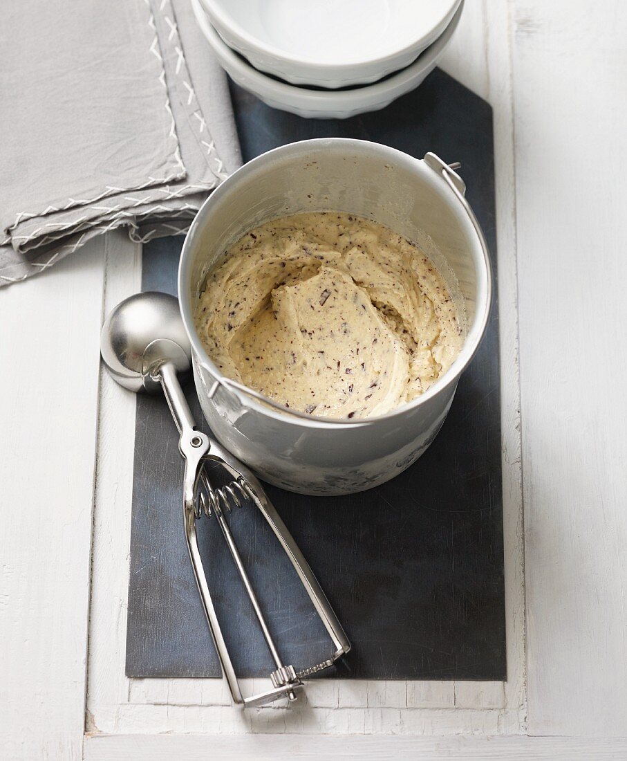 Homemade lactose-free marzipan ice cream with chocolate flakes