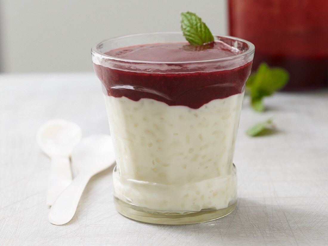 Lactose-free rice pudding with berry sauce