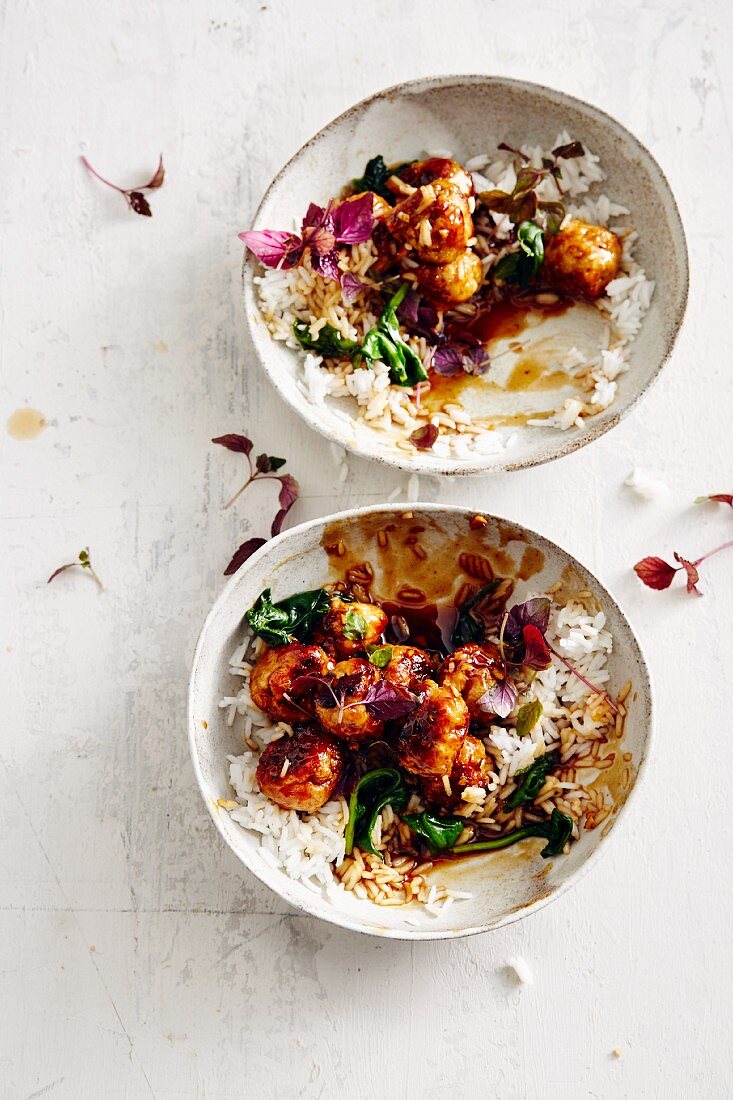 Teriyaki chicken balls with mirin sauce, baby leaf spinach and rice (soul food)