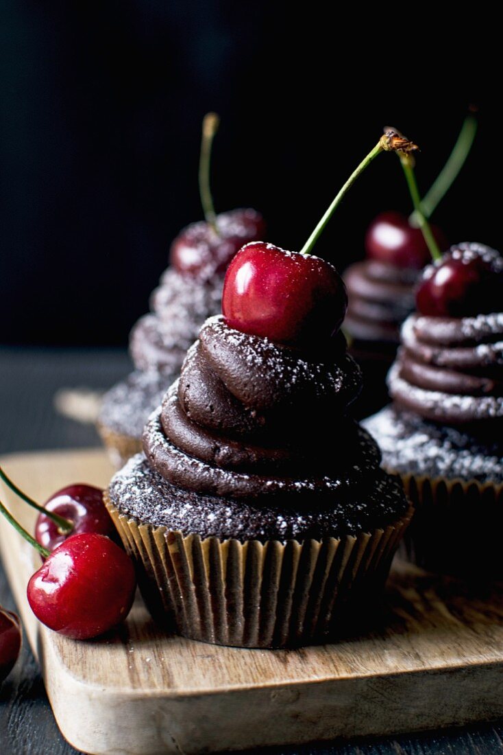 Chocolate cupcakes with cherries
