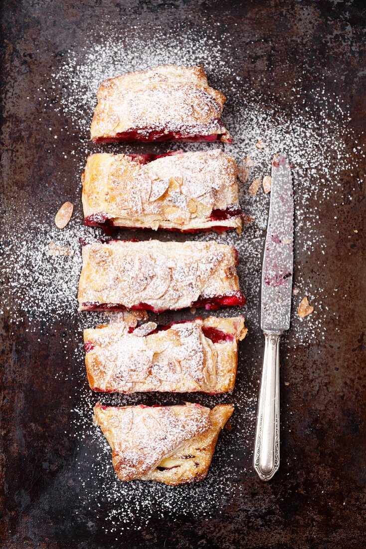Puff pastry strudel with cherries and föaked almonds