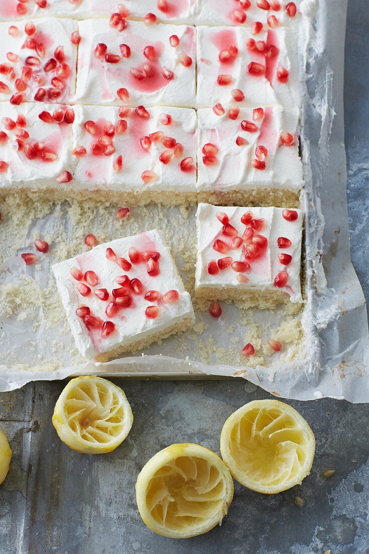 Sugar-free lemon slices topped with cream and pomegranate seeds