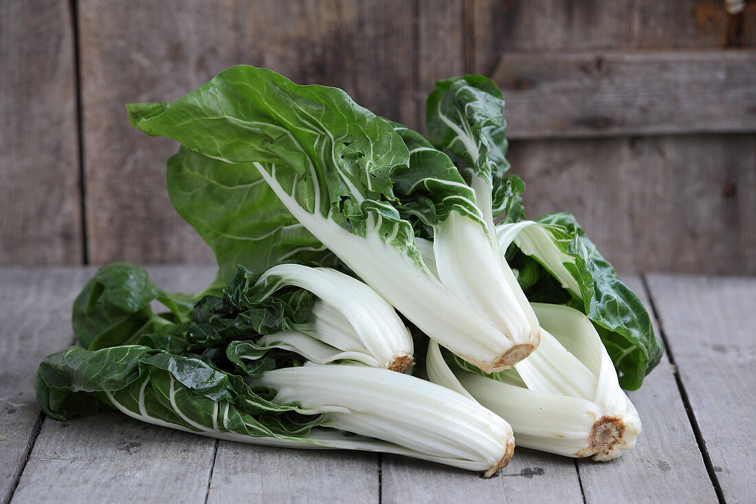 Fresh chard on a wooden surface