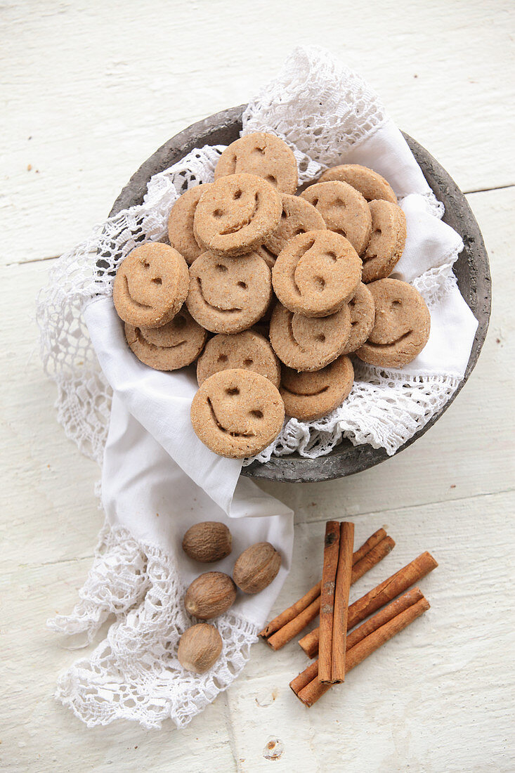 Spiced spelt biscuits with smiley faces