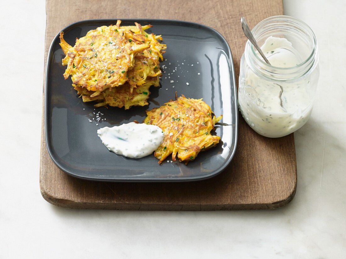 Sweet potato and carrot rosti cakes with herb and yoghurt dip