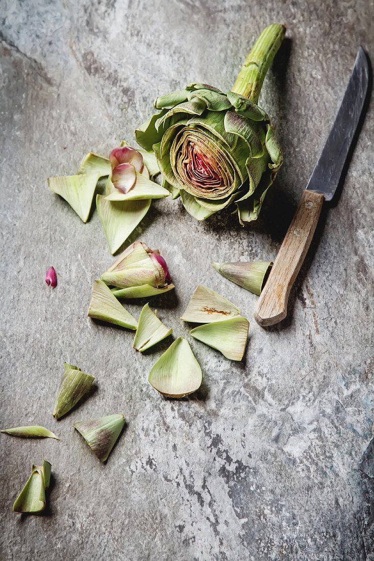 Baby Ripe Organic Artichokes on the rustic background