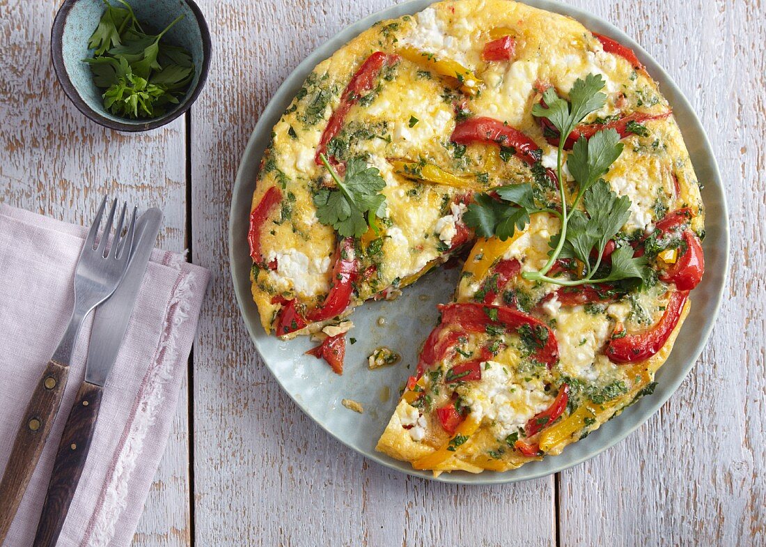 Vegetarian and herb frittata with red pepper and feta