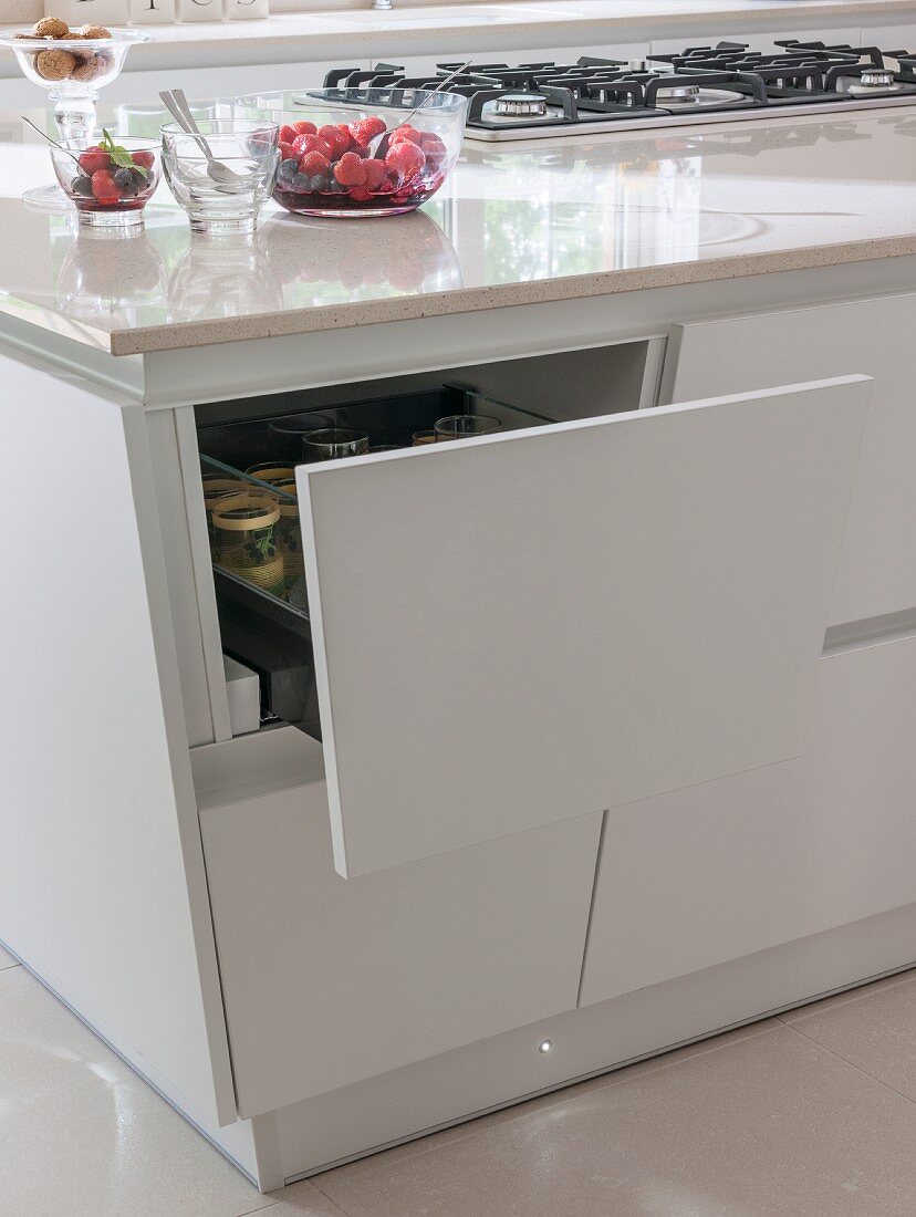 Open drawer in tapering island counter