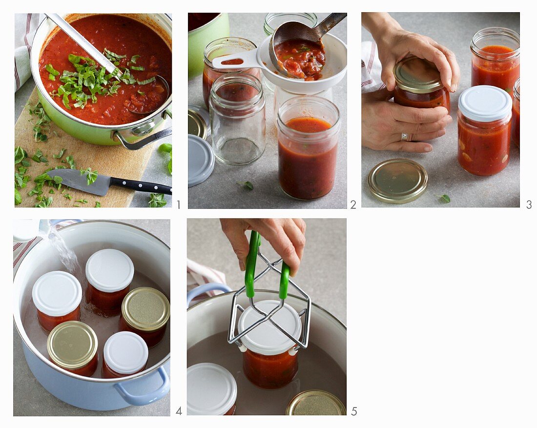 Tomato sauce with herbs being put into jars