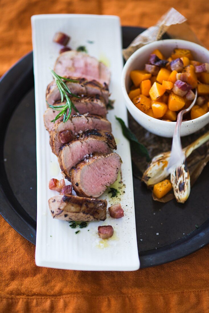 Sliced pork fillet with butternut squash