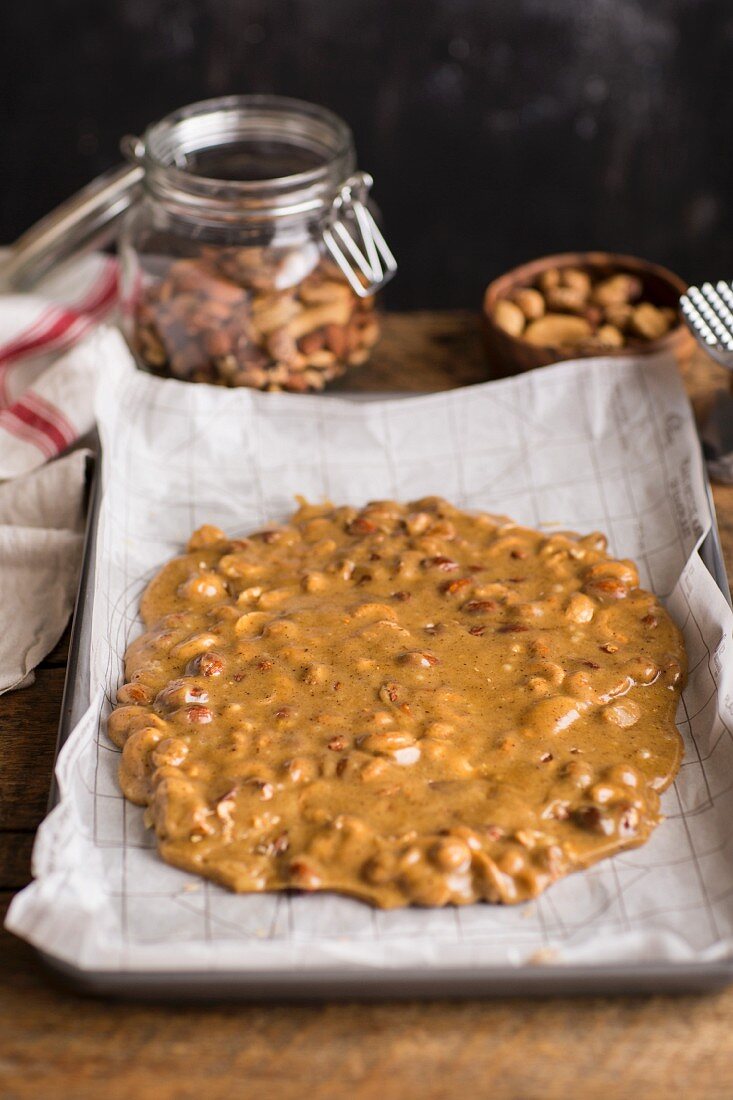 Nut brittle on a baking sheet (unbaked)