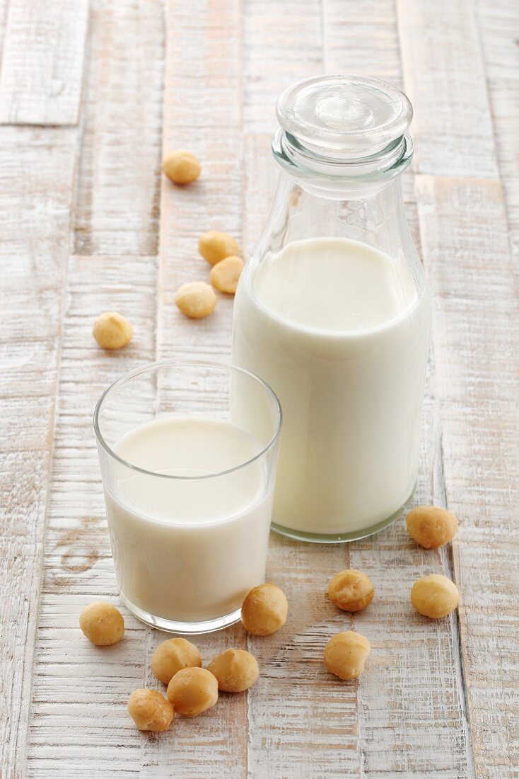 Macadamia milk in a bottle and glass