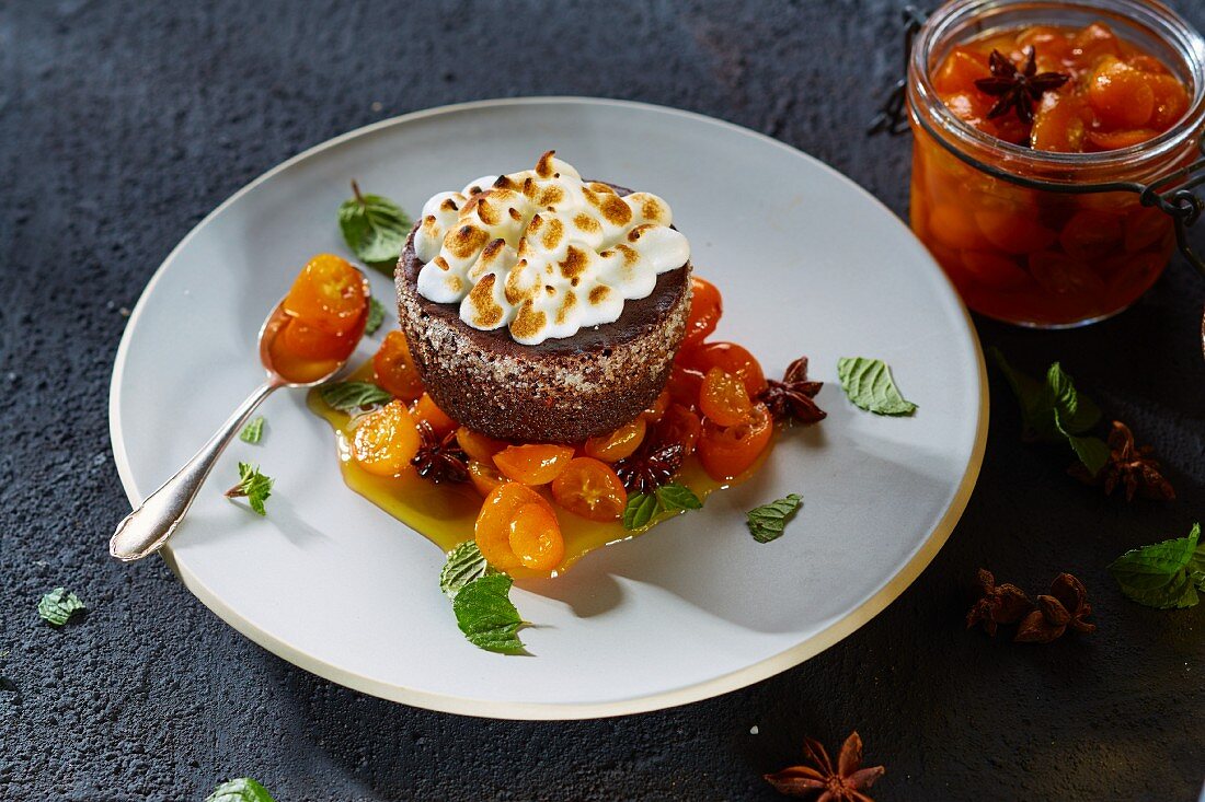 Chocolate cake with meringue and candied kumquats