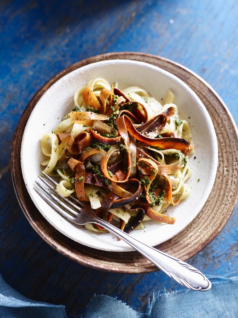 Carrot noodles with basil and walnut pesto