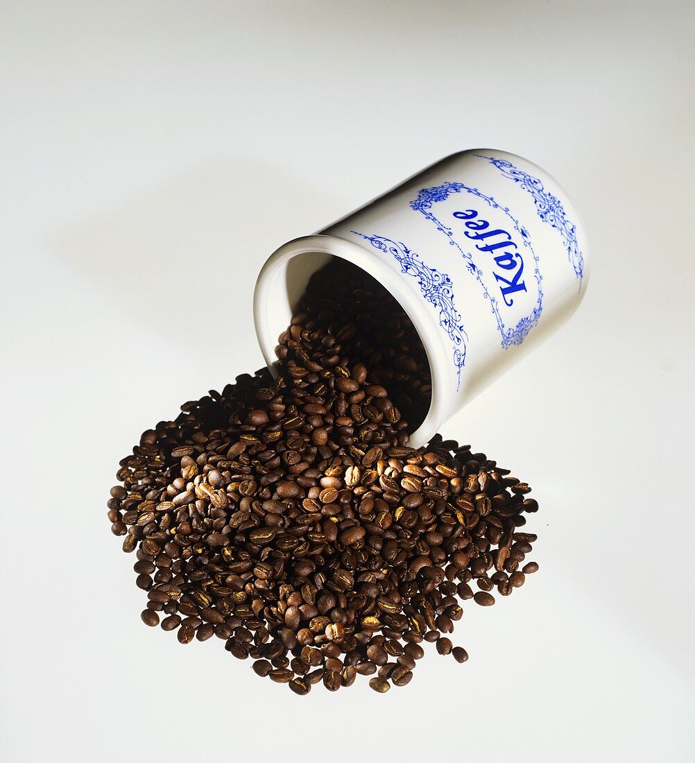 Coffee Beans Spilling from a Coffee Can