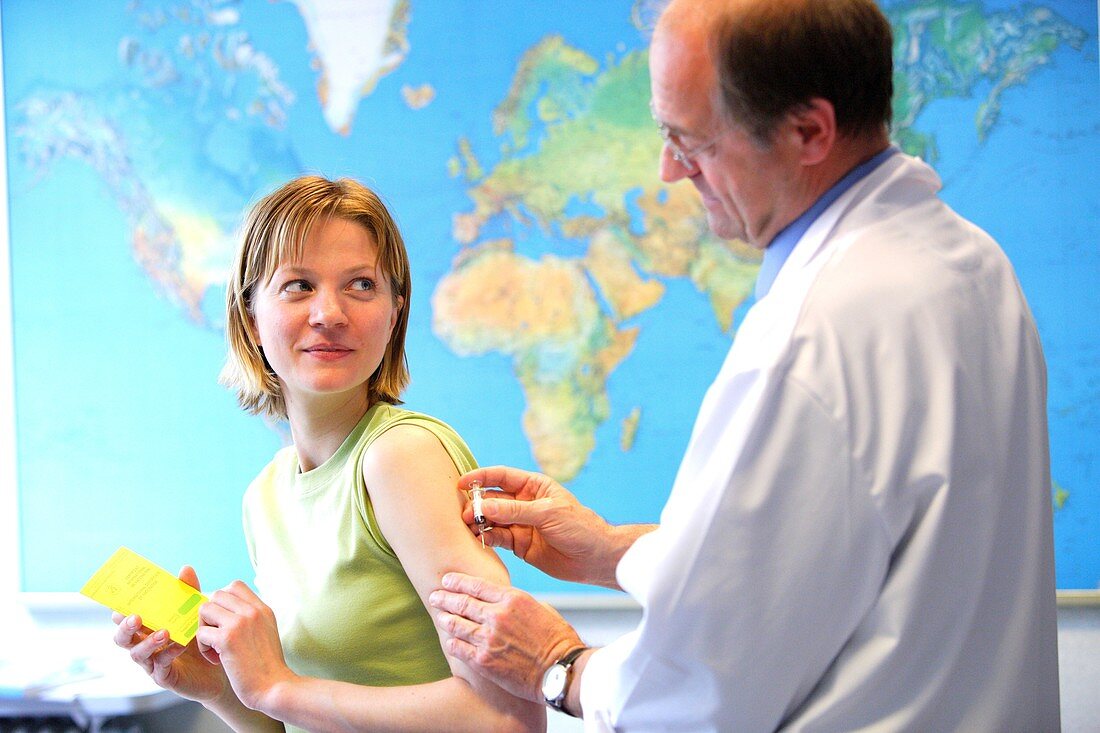 Woman receiving vaccination