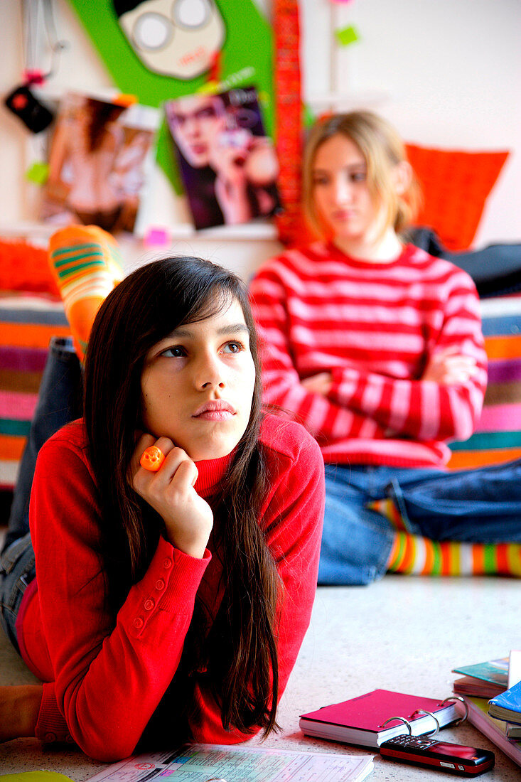 Two teenage girls in bedroom
