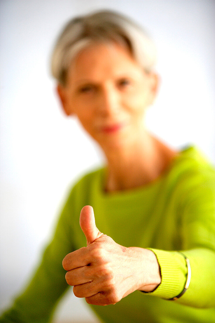 Woman giving thumbs up