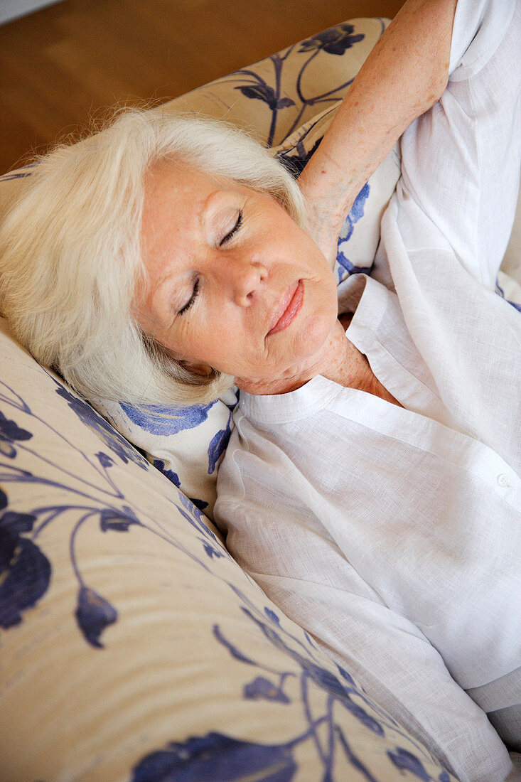 Elderly woman resting