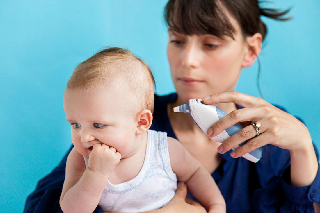 Checking baby's temperature