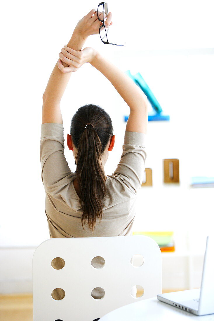 Woman stretching her arms