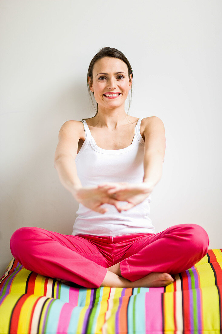 Woman stretching arms