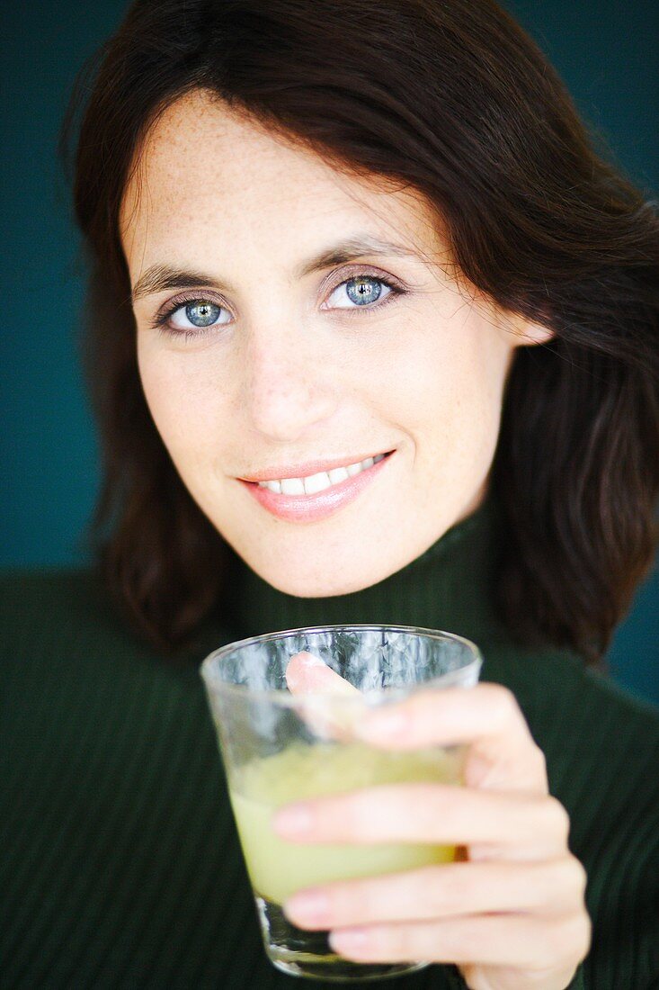 Woman drinking juice