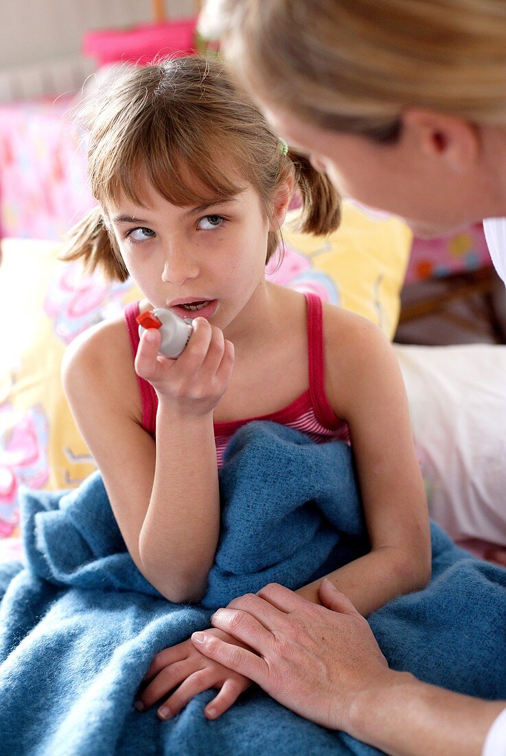 Child using aerosol inhaler