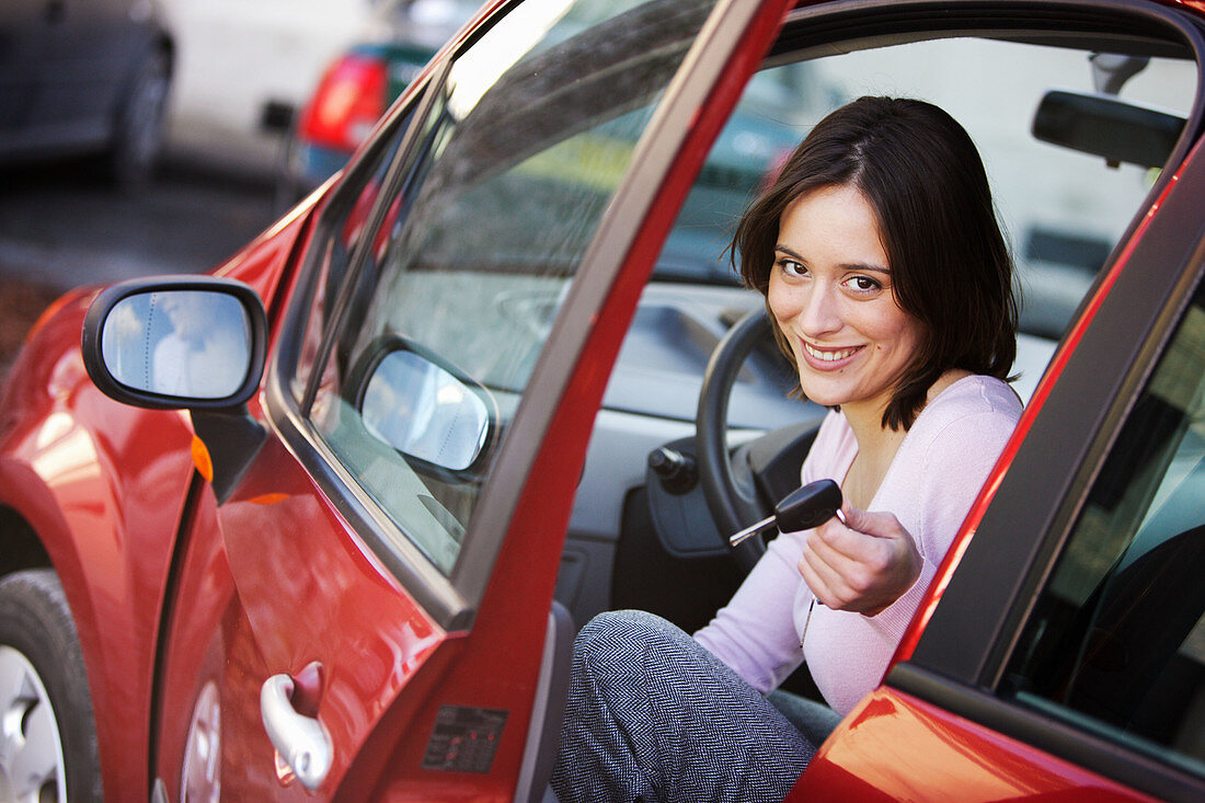 Woman sitting in car