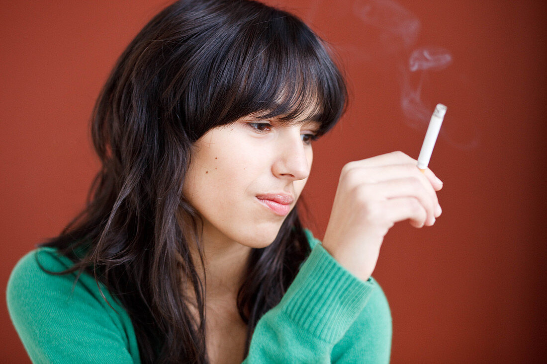 Teenage girl smoking a cigarette
