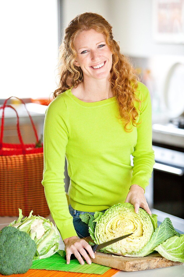 Woman preparing cabbage